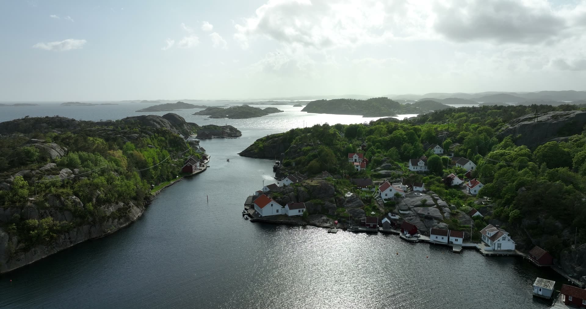 Sheltered inlet with forested banks and distant open sea, Ny-Hellesund, Norway