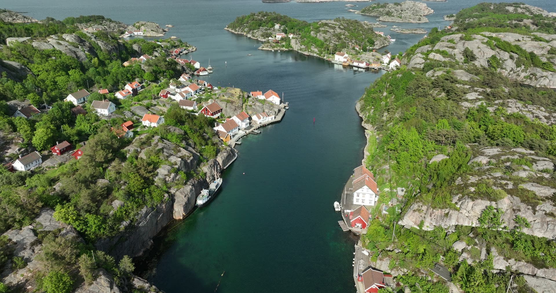 Solitary house perched on rocky outcrop, Ny-Hellesund, Norway