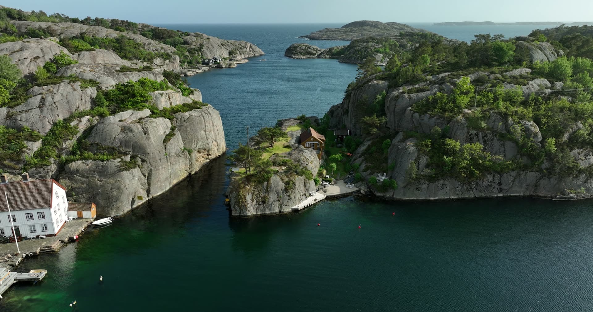 Narrow channel with steep granite walls, Ny-Hellesund, Norway
