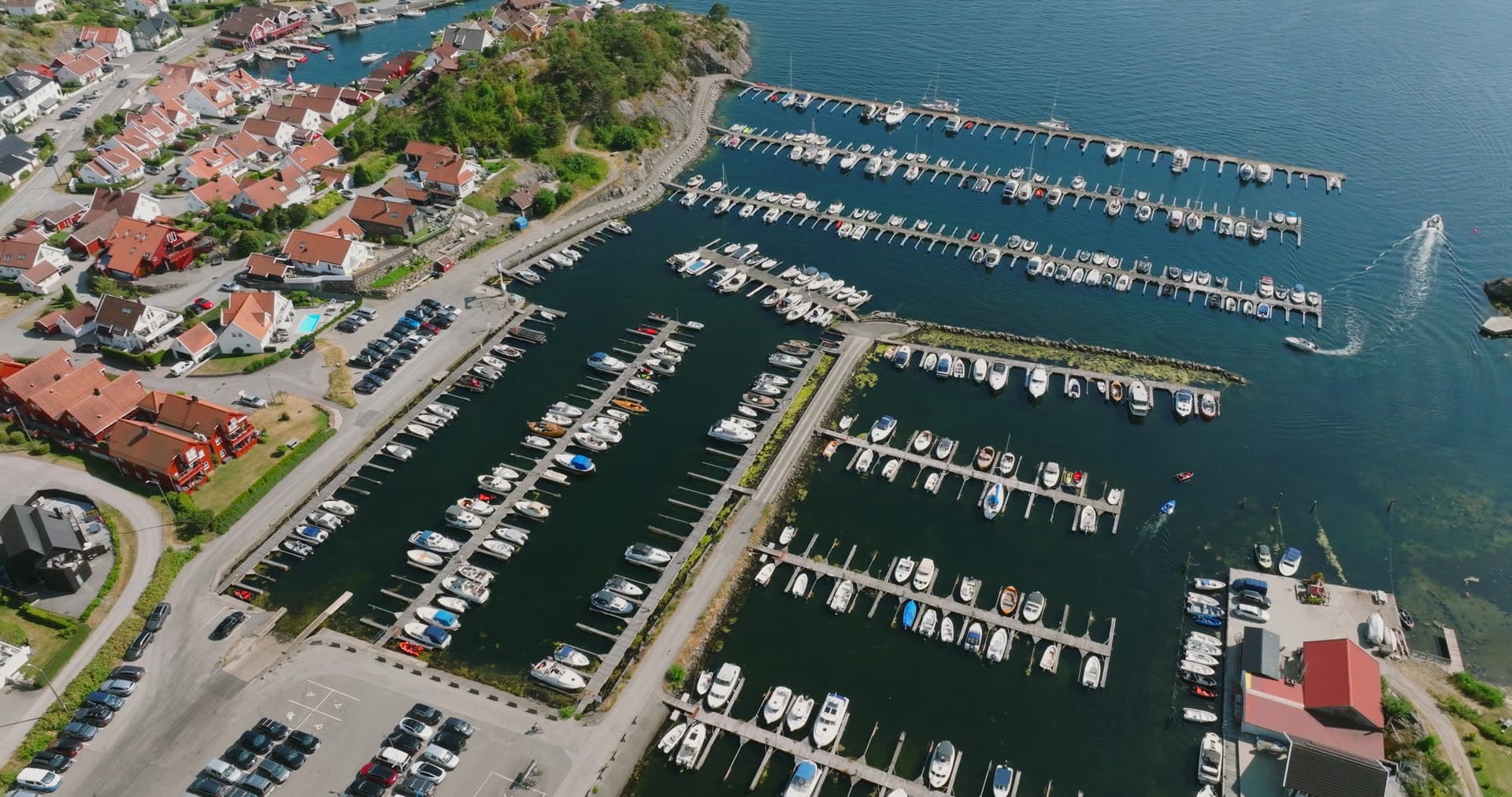 Marina basin with orderly moored boat rows, Høllen, Norway