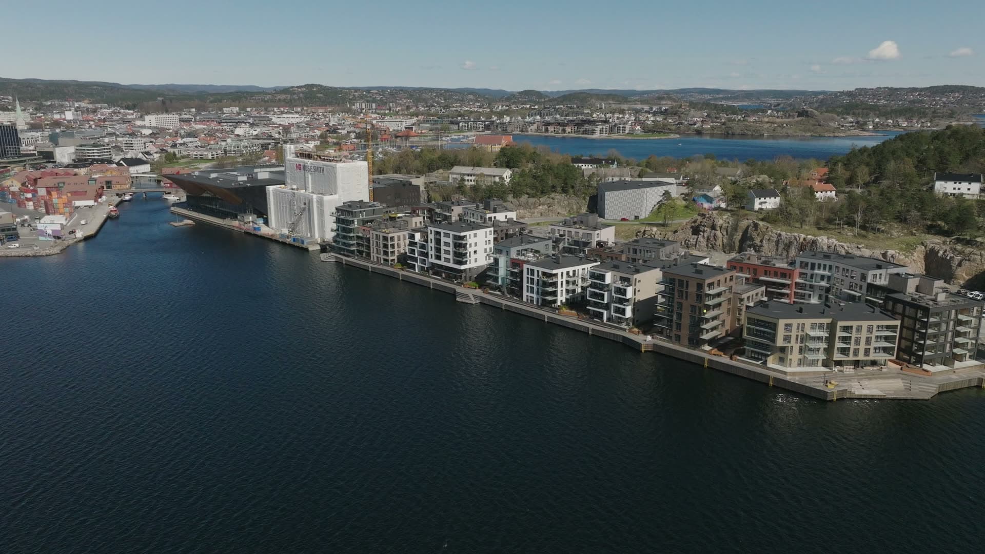 Waterfront residential development beside rocky outcrop, Kristiansand, Norway