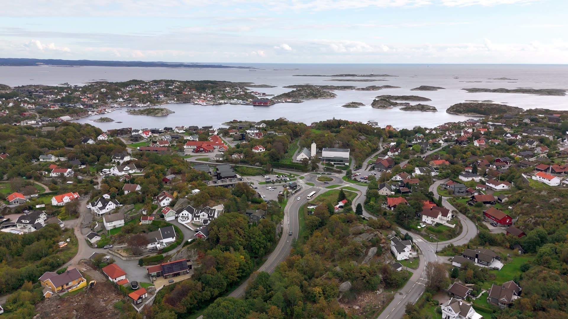 Red-roofed houses scattered across rocky terrain, Flekkerøy, Norway
