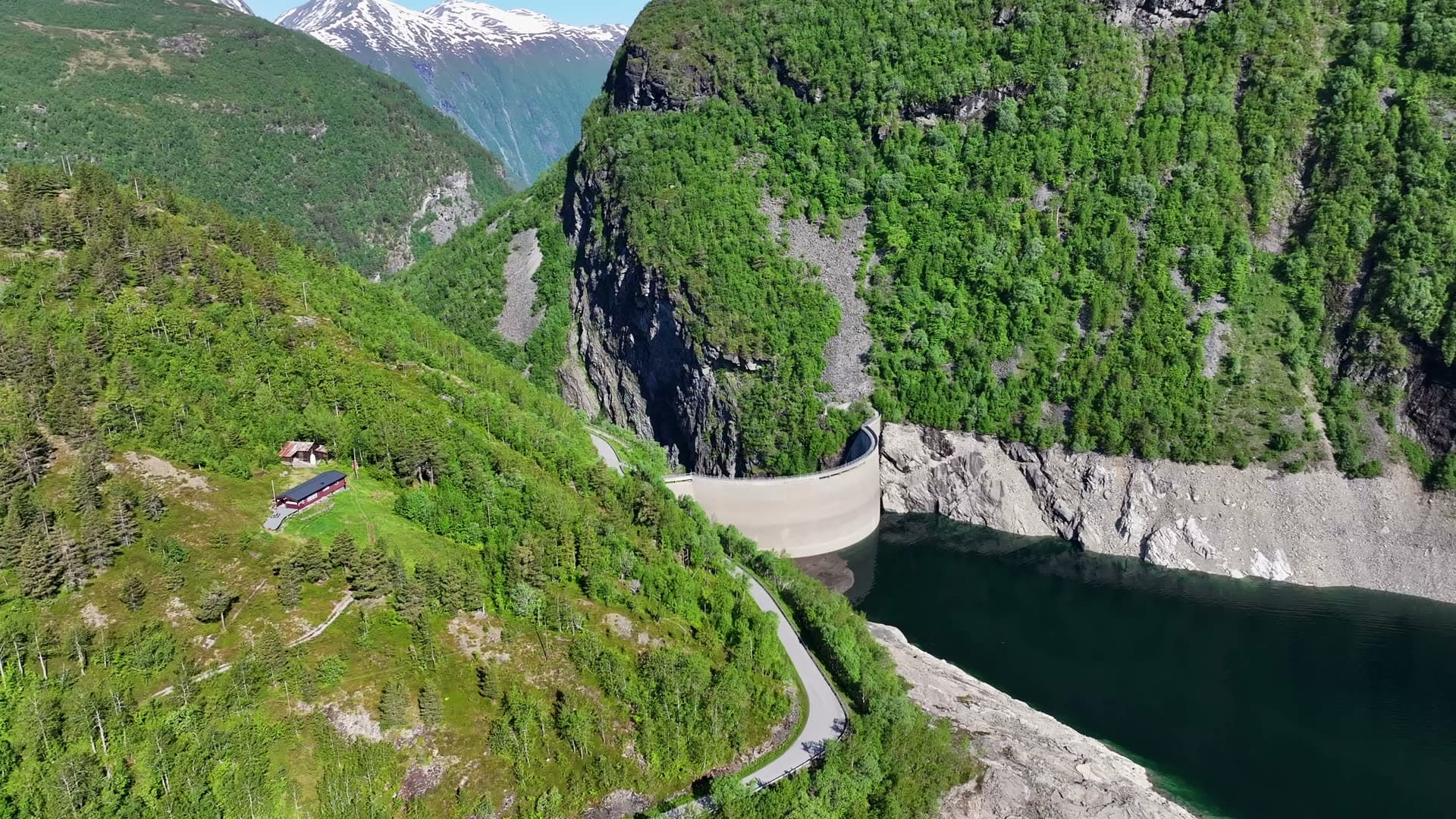 Aerial approach to Zakariasdammen and its reservoir in Tafjord