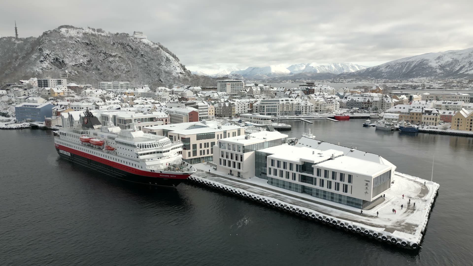 Richard With coastal passenger ship at a snowy Ålesund quay