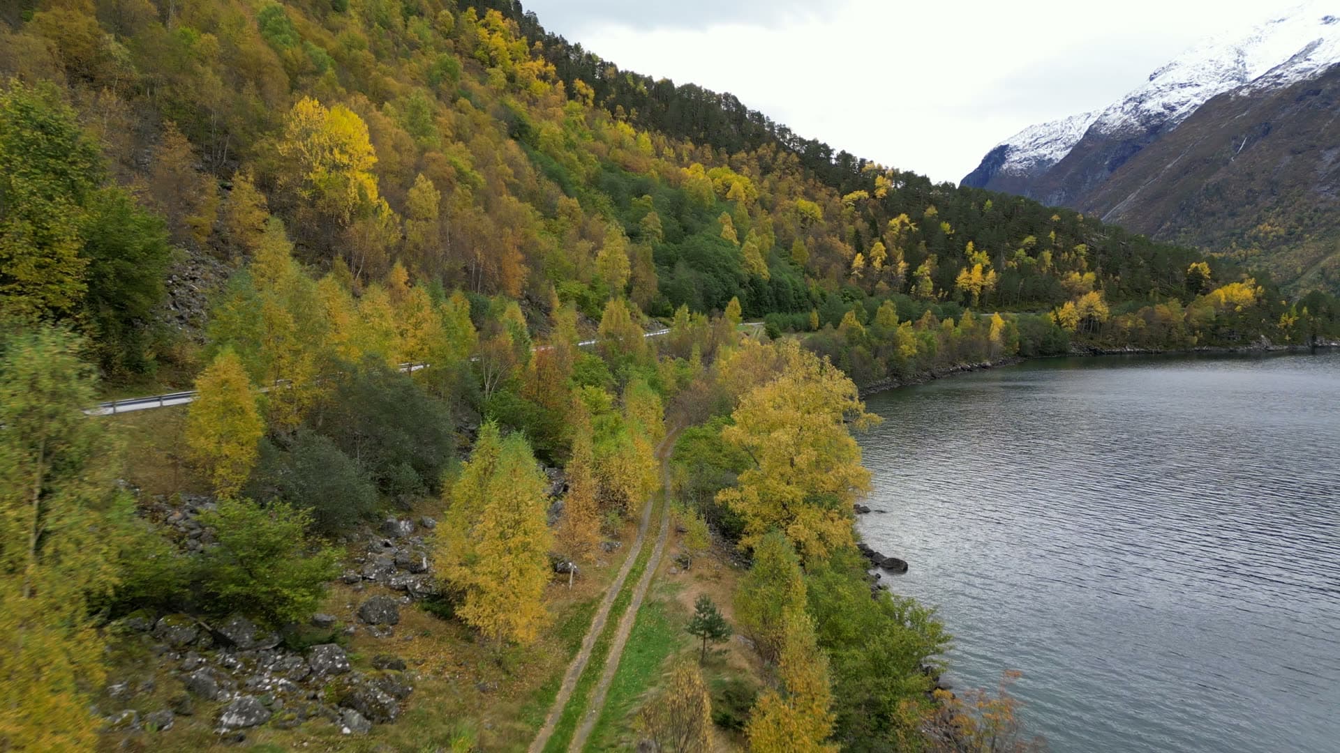 Autumn lakeshore and mountain slopes at Vike, Eikesdal