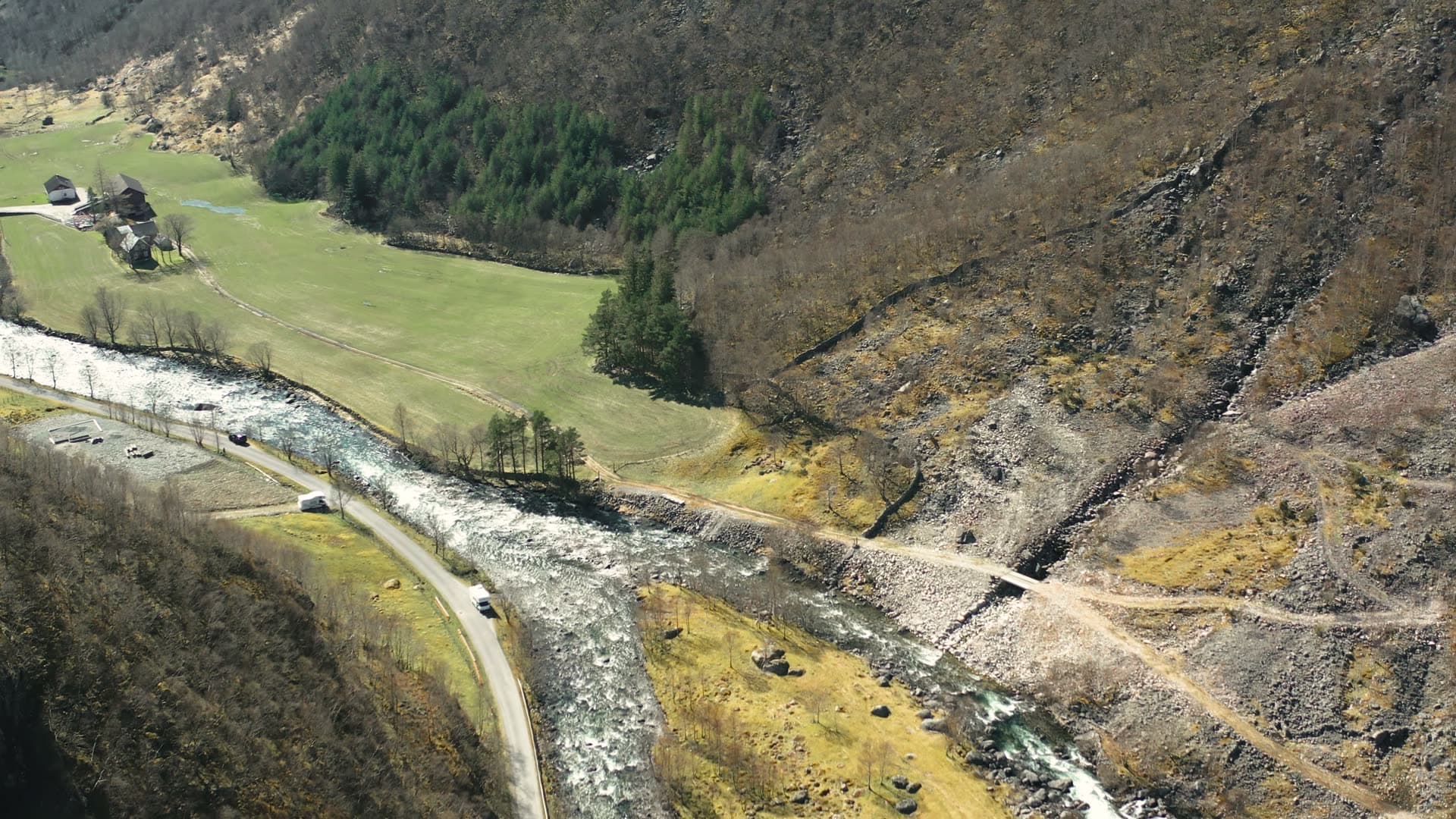 Mountain river winding through alpine valley, Månafossen