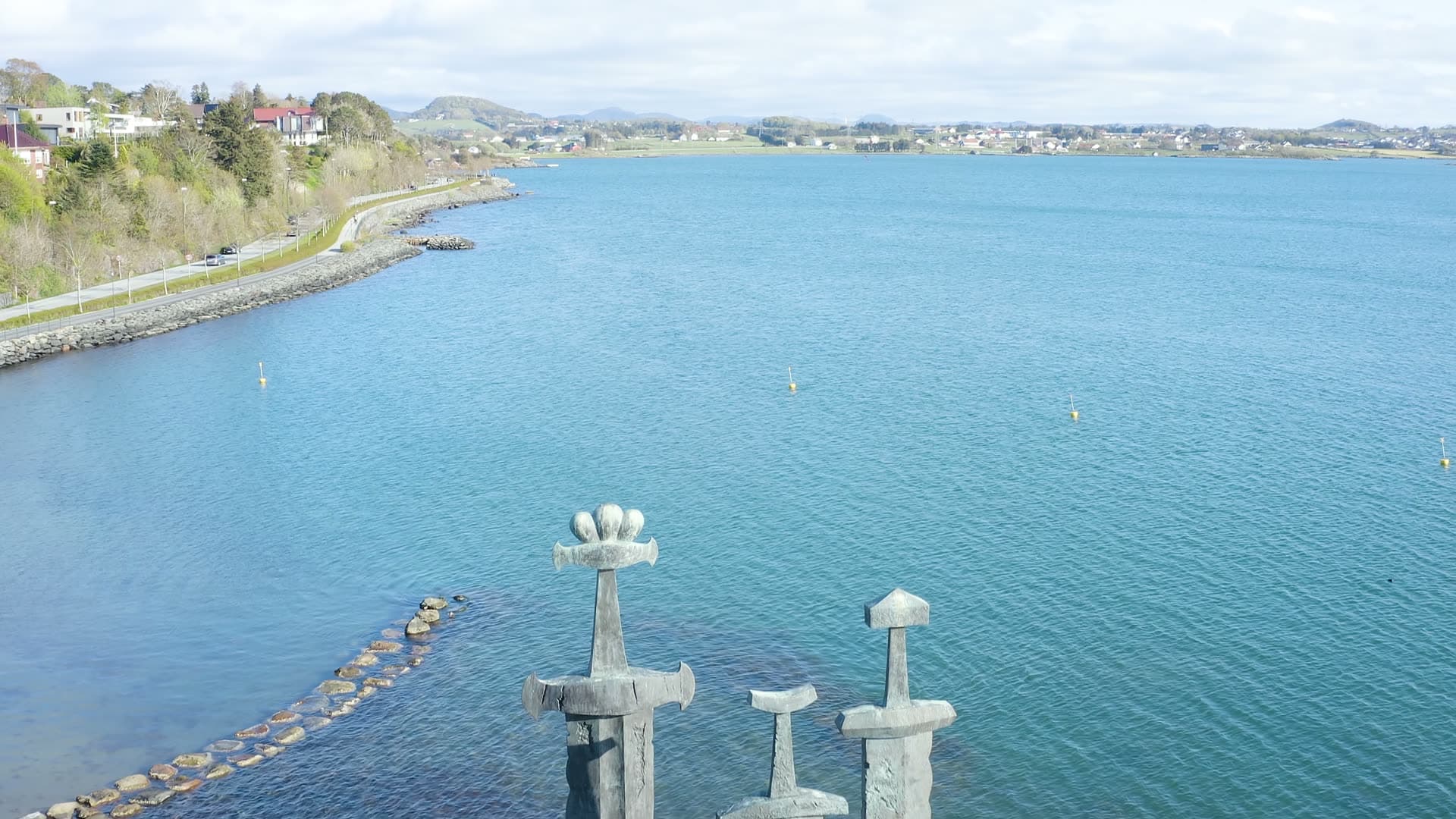 Three swords in stone in coastal waters, Sverd i fjell