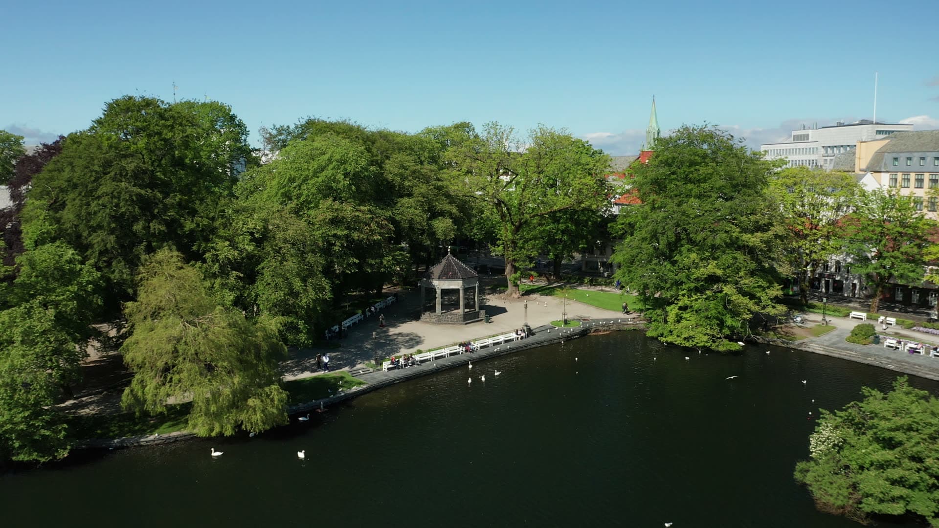 Urban lakeside park with pavilion, Stavanger