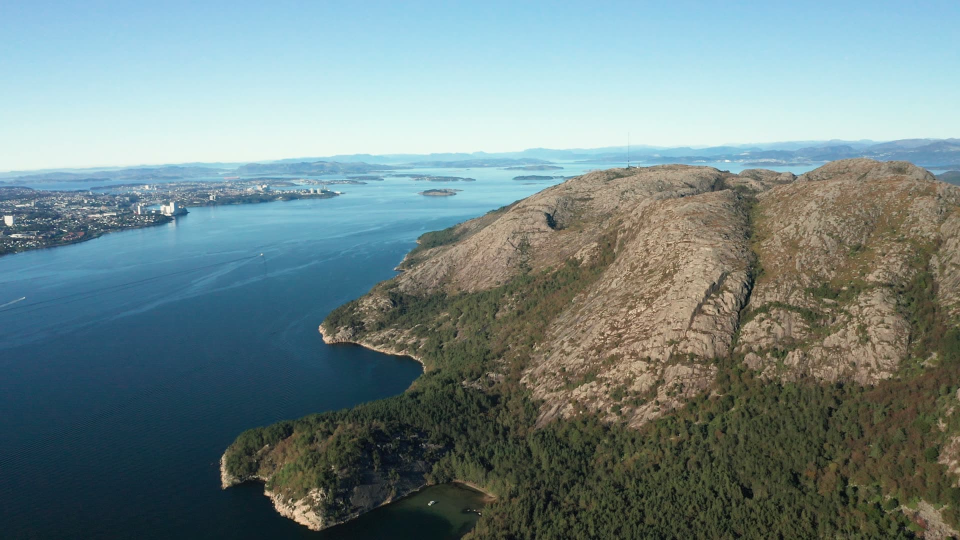 Rocky fjord cliff with forested slopes, Dalsnuten