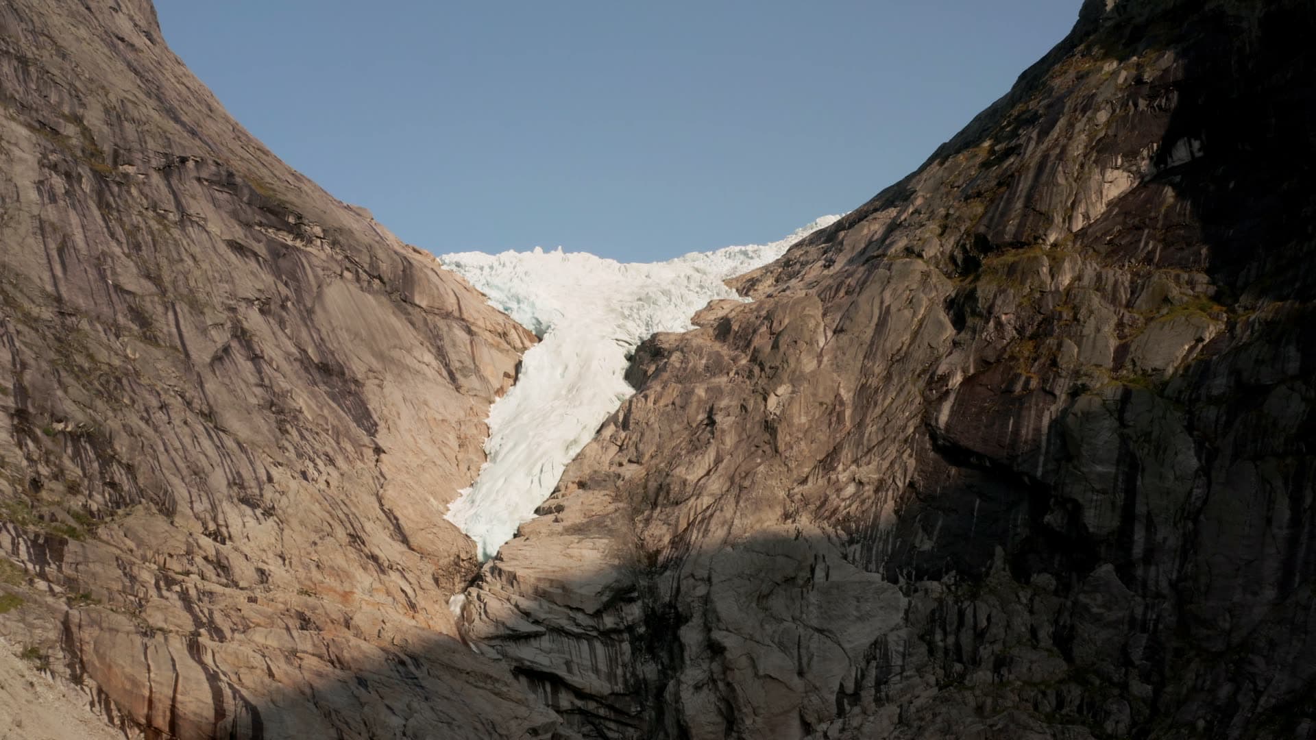 Glacier between mountain cliffs, Briksdalsbreen