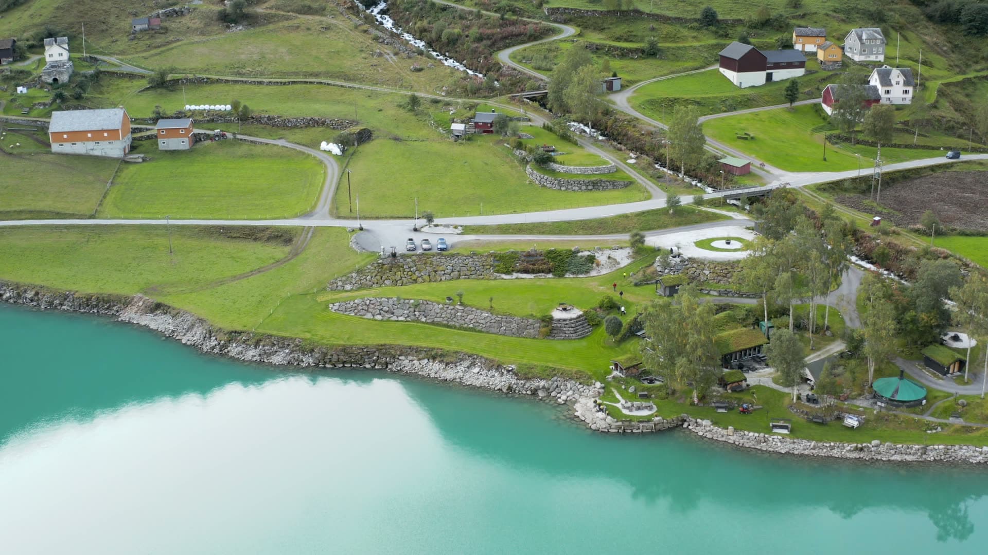 Remote fjord valley farm with turquoise waters, Oldevatnet