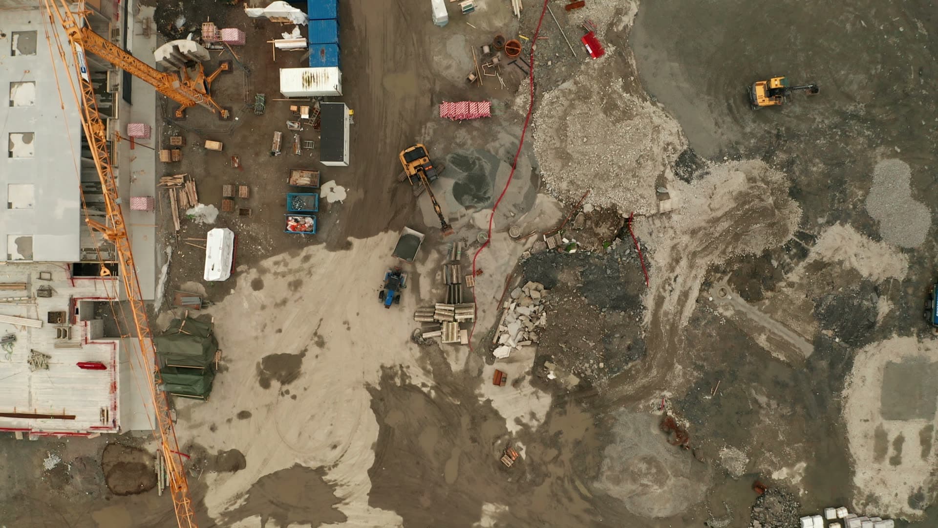 Waterfront construction site with cranes and equipment, Lervig