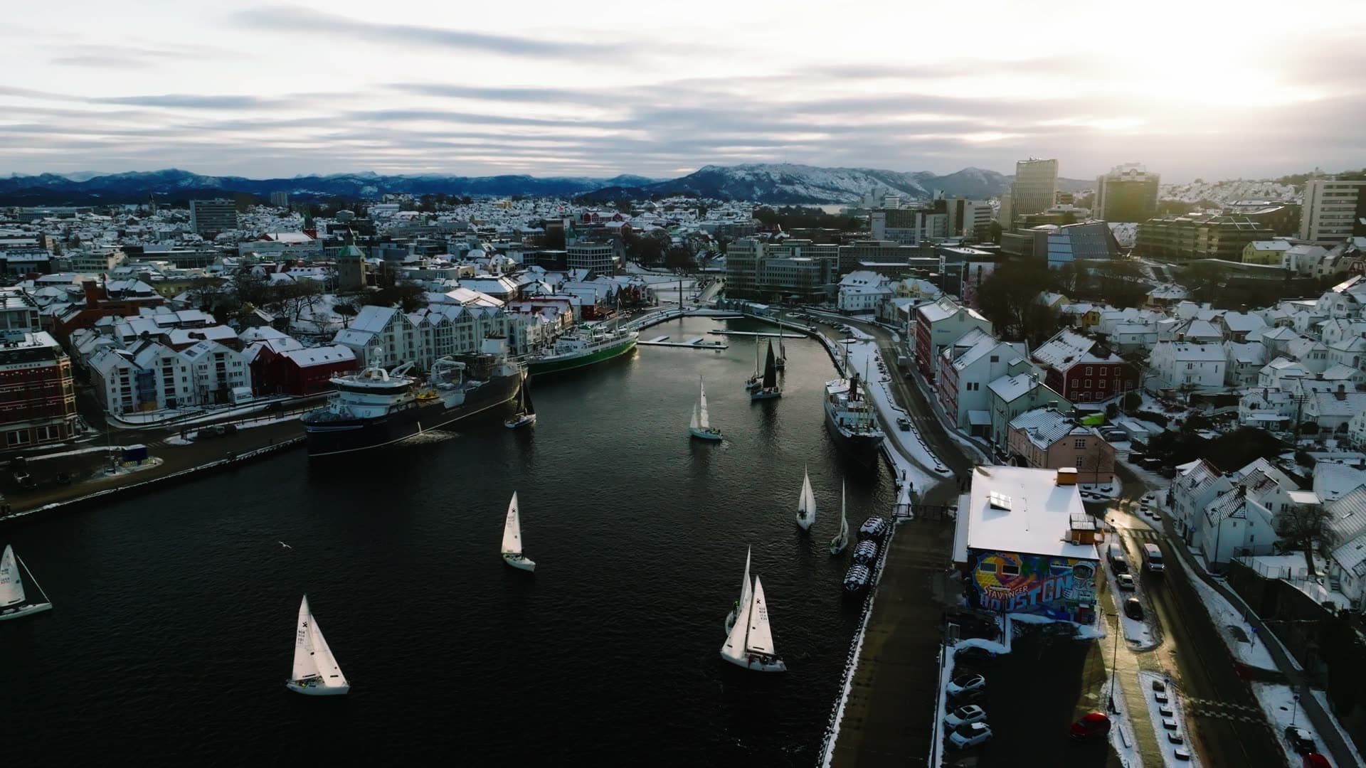 Sailboats in winter harbor at dusk, Stavanger