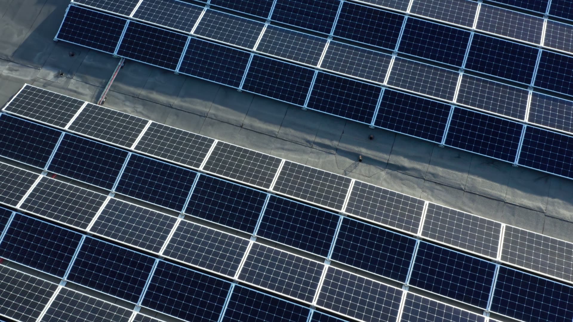 Large solar panel array rooftop installation, Forus