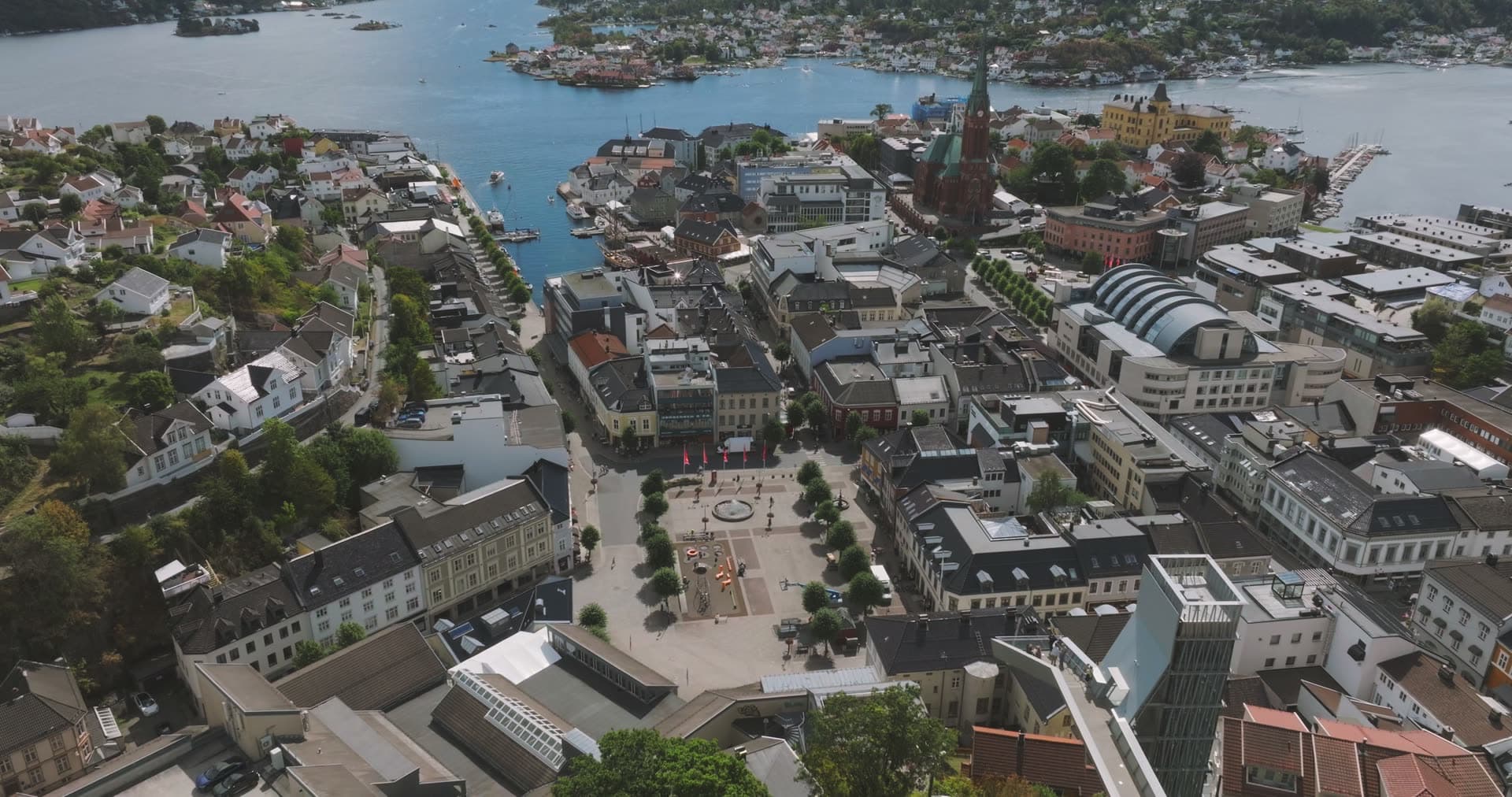 Town square plaza with surrounding mixed architecture, Arendal, Norway
