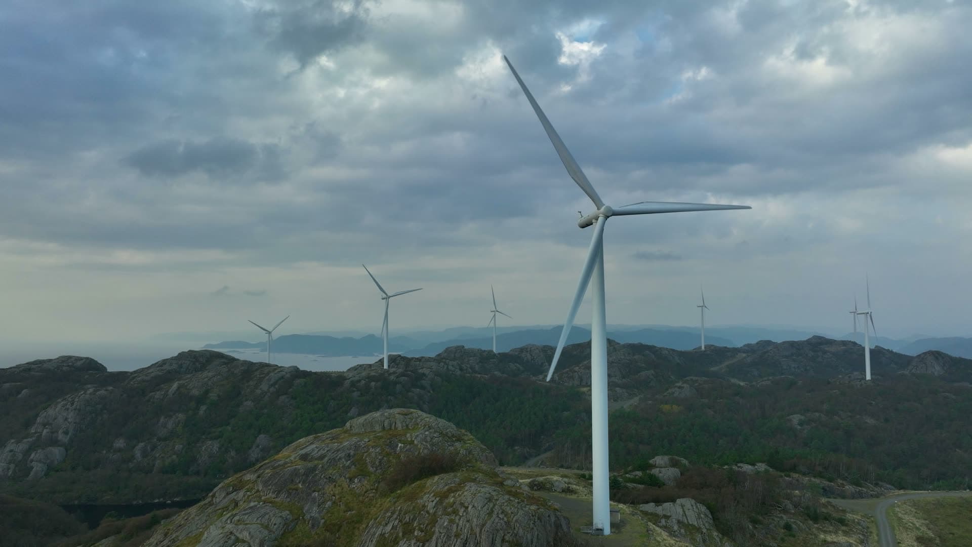 Wind turbine tower viewed from below angle, Lista, Norway
