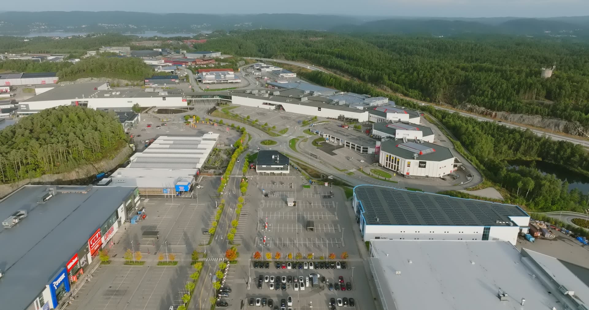 Solar panel roof dominating foreground above parking, Sørlandsparken, Kristiansand, Norway