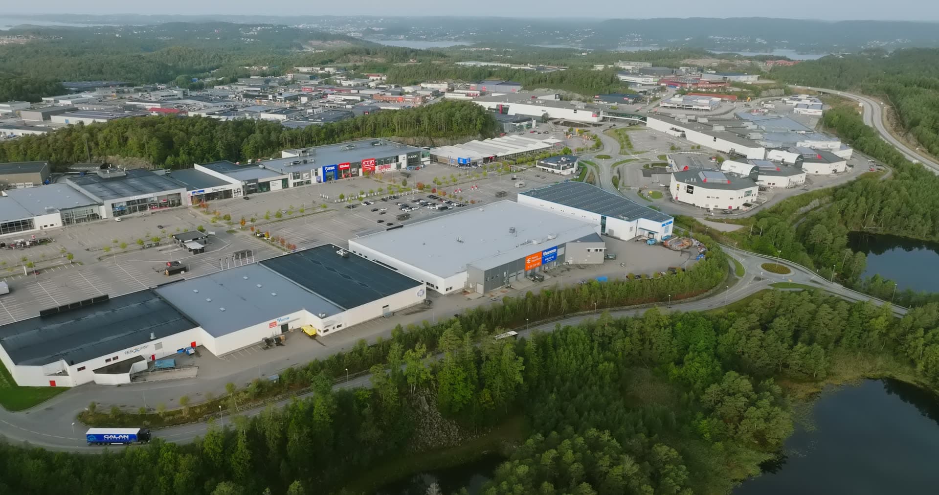 Retail complex nestled between forest and waterways, Sørlandsparken, Kristiansand, Norway