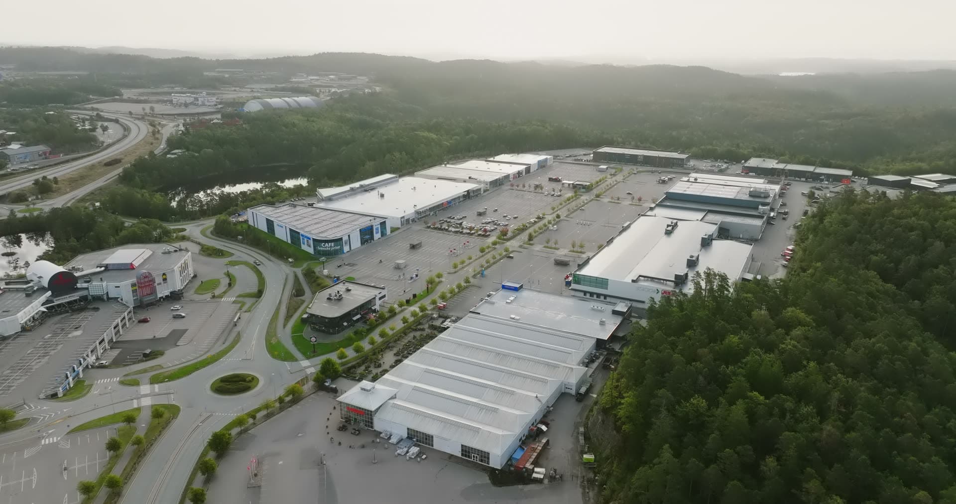 Industrial warehouses with white metal roofs, Sørlandsparken, Kristiansand, Norway