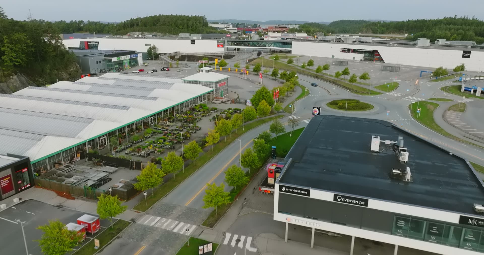 Sports arena with dark roof overlooking retail district, Sørlandsparken, Kristiansand, Norway