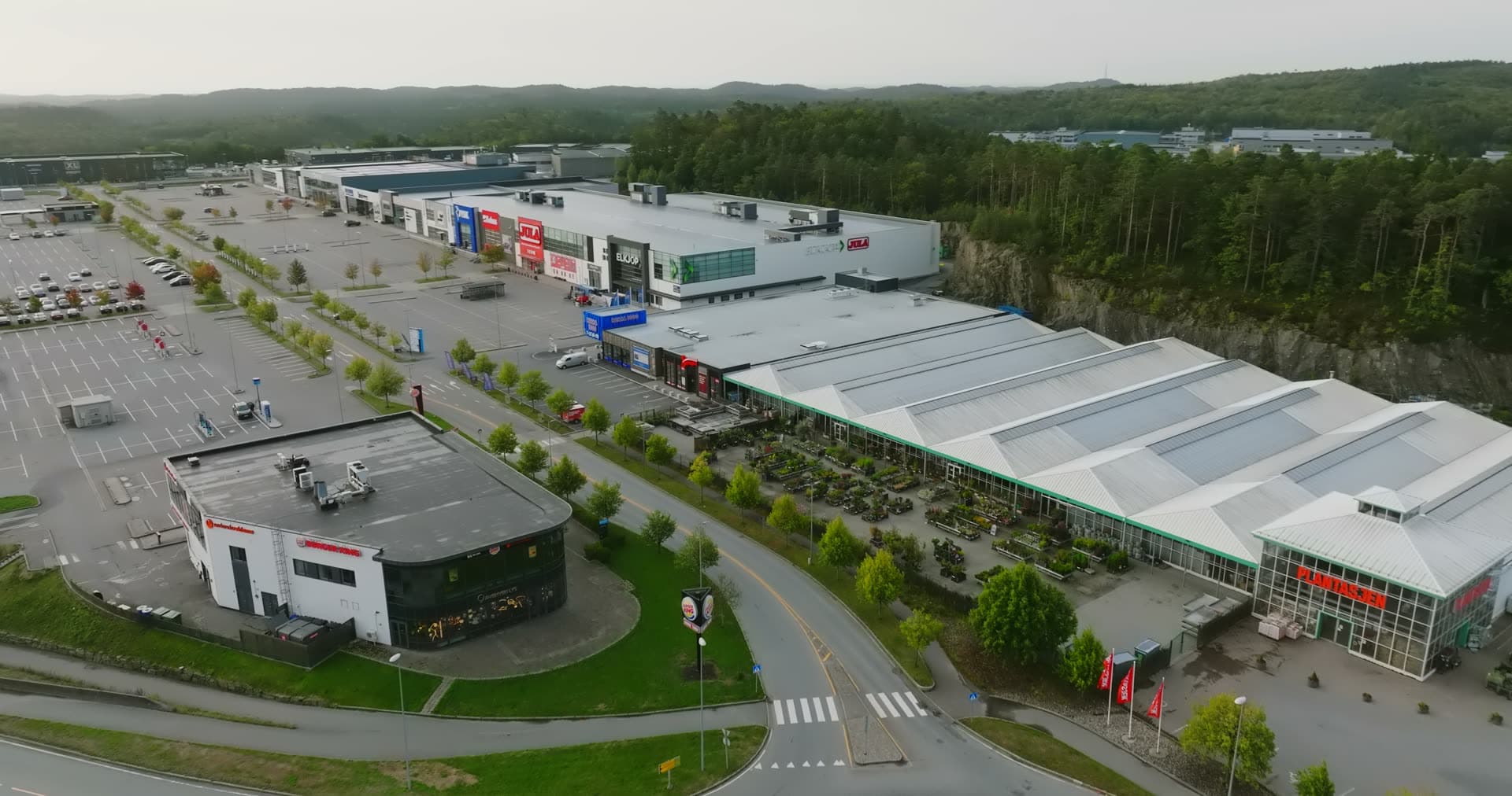 Greenhouse structure with solar panels overlooking retail, Sørlandsparken, Kristiansand, Norway